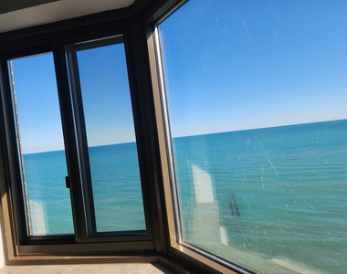 7337 S South Shore Drive - Photo Thumbnail 2