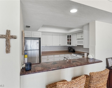 9715 Gulf Shore Drive - Photo Thumbnail 5