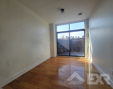 55-27 Myrtle Avenue - Photo Thumbnail 1