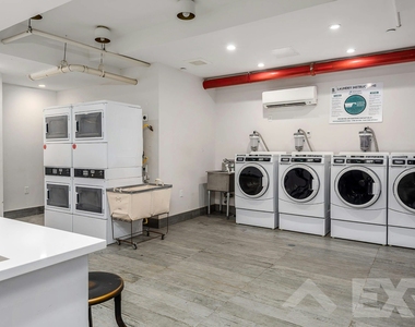 55-27 Myrtle Avenue - Photo Thumbnail 14
