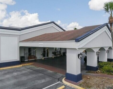 8700 S Orange Blossom Trail - Photo Thumbnail 3
