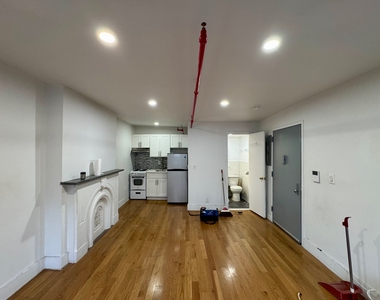9 West 129th Street - Photo Thumbnail 3
