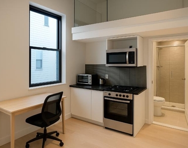 W 51st St - Photo Thumbnail 1