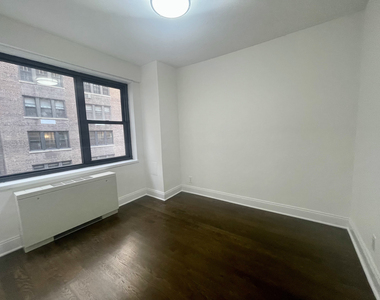 E 56th and 1st Ave - Photo Thumbnail 9