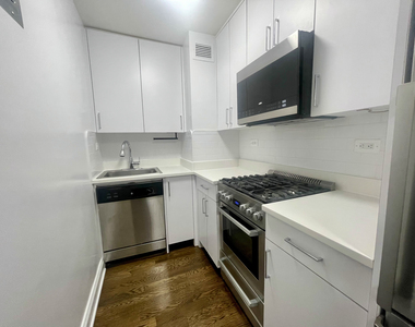 E 56th and 1st Ave - Photo Thumbnail 1