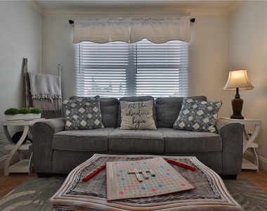 813 E 6th Avenue - Photo Thumbnail 1