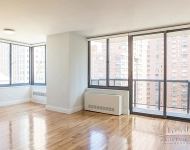W 48th St - Photo Thumbnail 1