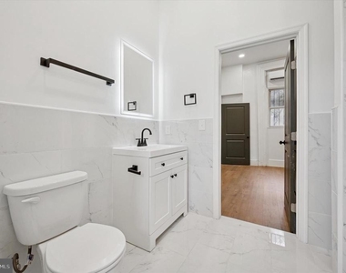 1637 W Girard Avenue - Photo Thumbnail 2