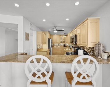 10562 Gulf Shore Drive - Photo Thumbnail 10