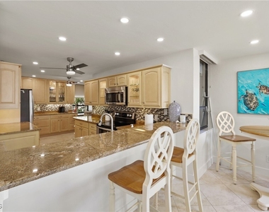10562 Gulf Shore Drive - Photo Thumbnail 8