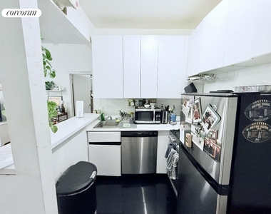 242 East 50th Street, - Photo Thumbnail 2