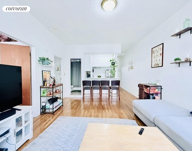 242 East 50th Street, - Photo Thumbnail 1