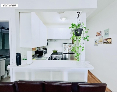 242 East 50th Street, - Photo Thumbnail 3