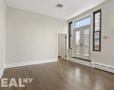 E 68th St - Photo Thumbnail 2