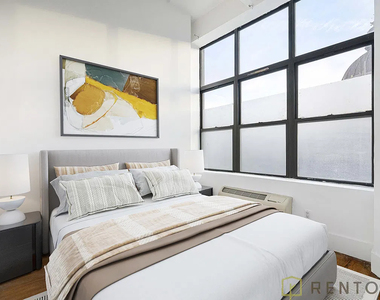 808 Driggs Avenue - Photo Thumbnail 2