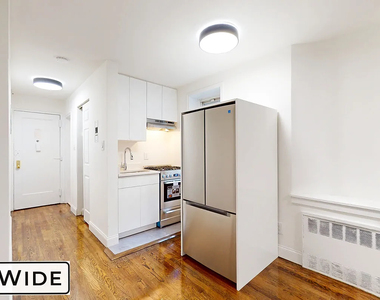 311 East 25th Street - Photo Thumbnail 3