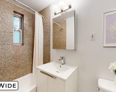 311 East 25th Street - Photo Thumbnail 4