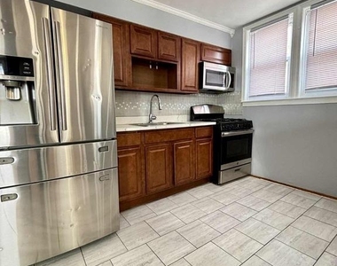 1303 E Johnson Street - Photo Thumbnail 1