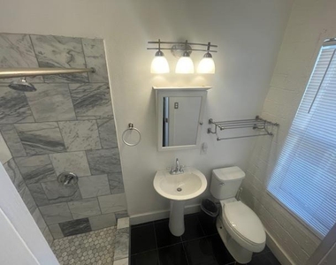 1105 E 6th St - Photo Thumbnail 2