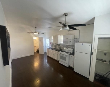 1105 E 6th St - Photo Thumbnail 6