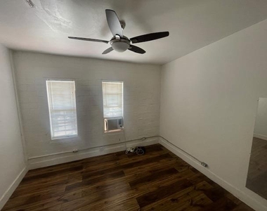 1105 E 6th St - Photo Thumbnail 3