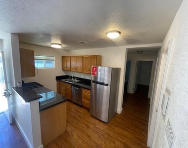 1113 E 3rd St - Photo Thumbnail 3
