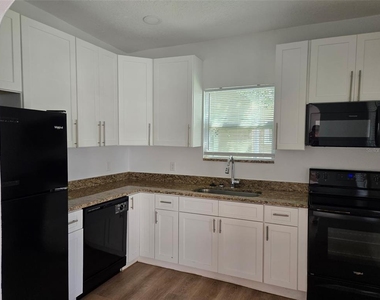 403 Avenue J Se - Photo Thumbnail 1