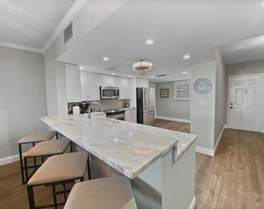 1445 Gulf Of Mexico Drive - Photo Thumbnail 1