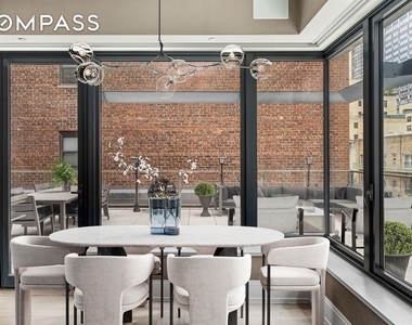 301 E 50th Street - Photo Thumbnail 1