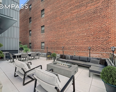 301 E 50th Street - Photo Thumbnail 3