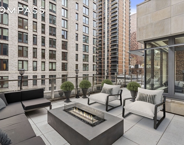 301 E 50th Street - Photo Thumbnail 2