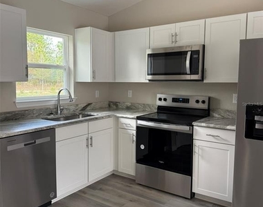 9545 N Travis Drive - Photo Thumbnail 3
