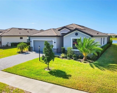15716 Barefoot Beach Drive - Photo Thumbnail 1