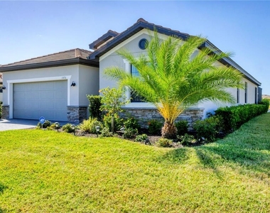 15716 Barefoot Beach Drive - Photo Thumbnail 2