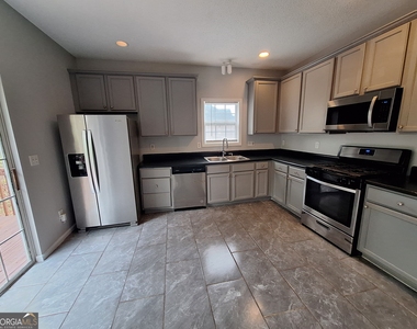 5633 Rutland Drive - Photo Thumbnail 4