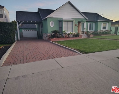 5446 Angeles Vista Boulevard - Photo Thumbnail 1