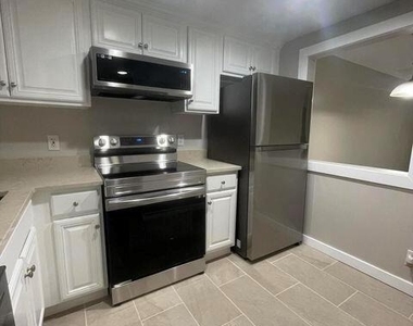 1638 Embassy Drive - Photo Thumbnail 1