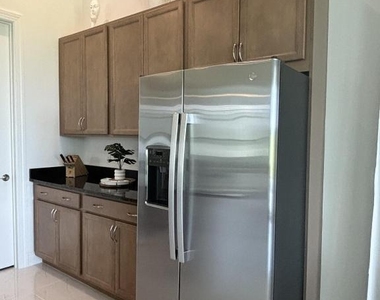 10231 Sw Latium Way - Photo Thumbnail 18