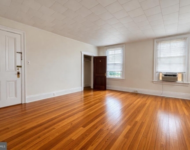 115 W Broadway - Photo Thumbnail 2