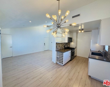 1237 N Ogden Drive - Photo Thumbnail 2