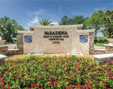 5950 Pelican Bay Plaza S - Photo Thumbnail 1
