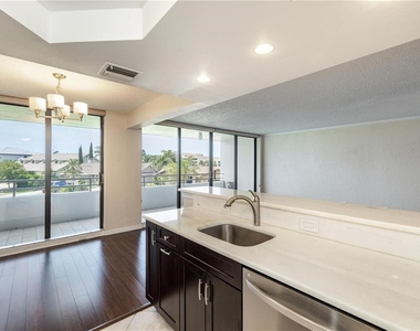 5950 Pelican Bay Plaza S - Photo Thumbnail 6
