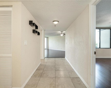 5950 Pelican Bay Plaza S - Photo Thumbnail 4