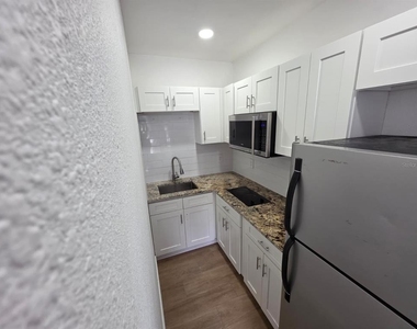 1614 N Washington Avenue - Photo Thumbnail 5