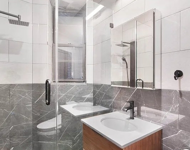 437 West 46th Street - Photo Thumbnail 3