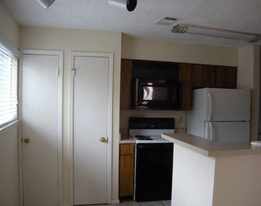 114 E 31st St - Photo Thumbnail 3