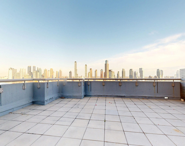 401 E 34th St - Photo Thumbnail 3