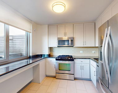 401 E 34th St - Photo Thumbnail 1