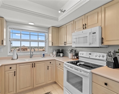 9577 Gulf Shore Drive - Photo Thumbnail 14