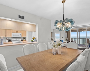 9577 Gulf Shore Drive - Photo Thumbnail 2